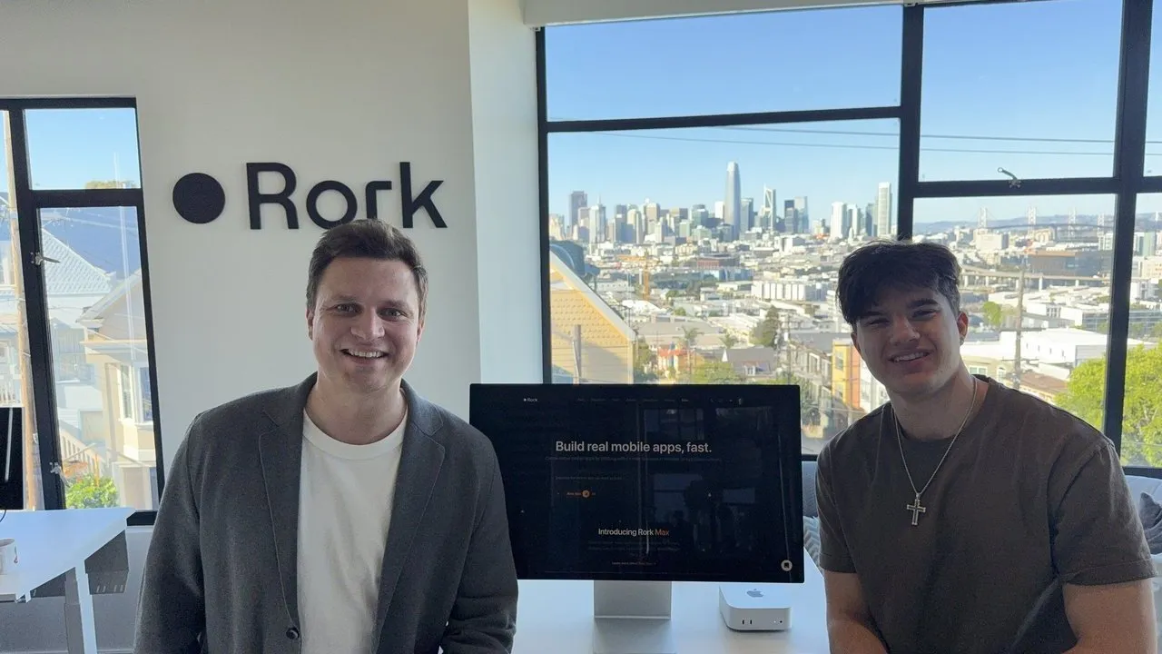 Daniel Dhawan and George Lampropoulos stand in a Rork office overlooking San Francisco.