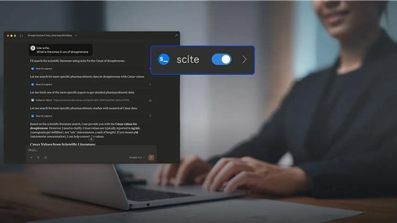 Person using a laptop with a scientific research chat interface and a Scite browser extension toggle.