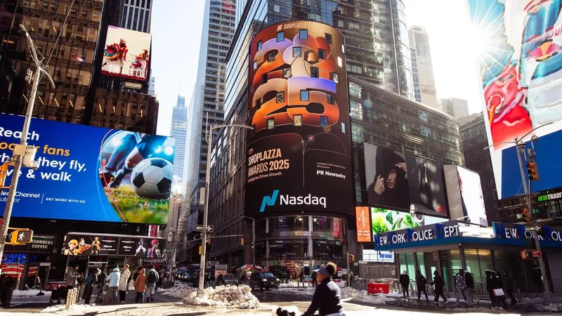 Shoplazza Awards 2025 billboard on the Nasdaq Tower above pedestrians and snowy streets in Times Square